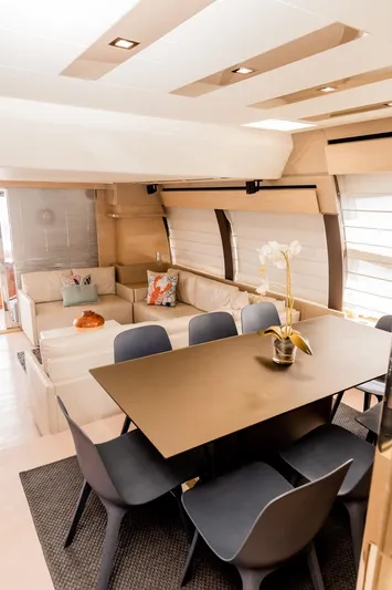  Yacht Photos Pics Luxurious interior of 2013 Ferretti Yachts 720 with modern dining area and cozy seating.