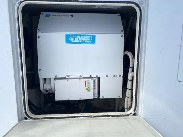 Cost Of Living Yacht Photos Pics Electrical panel inside 1985 Bertram 38 Convertible boat compartment.