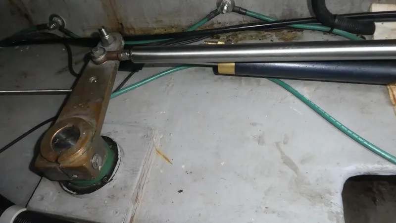  Yacht Photos Pics 1995 Riviera Convertible steering mechanism with hydraulic components and cables.