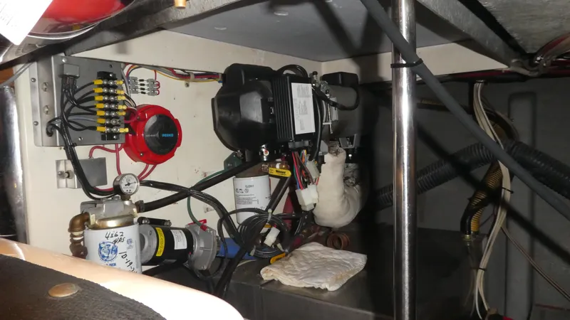  Yacht Photos Pics Engine compartment of a 1995 Riviera Convertible with wiring and mechanical components.