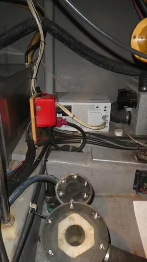  Yacht Photos Pics Engine compartment of a 1995 Riviera Convertible with wiring and mechanical components.