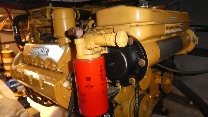  Yacht Photos Pics Caterpillar engine in a 1995 Riviera Convertible, showcasing detailed mechanical components.