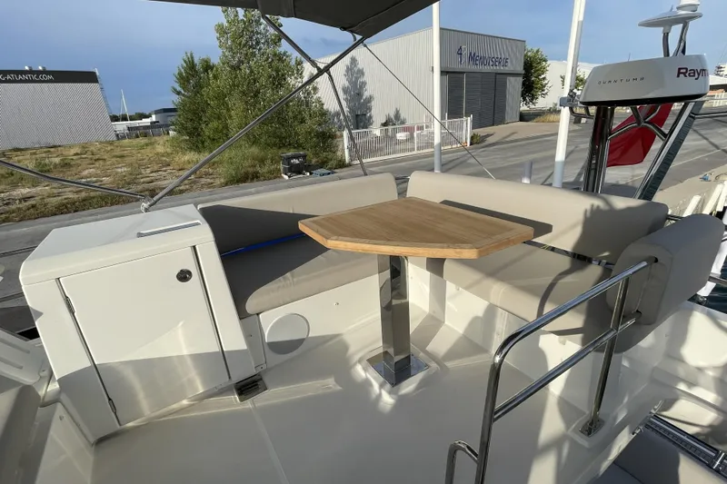  Yacht Photos Pics 2020 Prestige 420 yacht deck with seating and wooden table, featuring modern design elements.