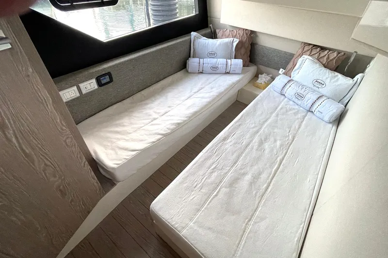  Yacht Photos Pics Interior of 2024 Sessa Marine F42 Flybridge with twin beds and modern design.