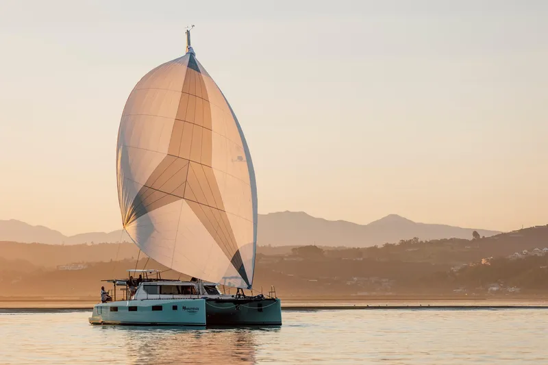 Vision 444es Yacht Photos Pics Vision 444 sailboat on calm water at sunset, 2025 model.