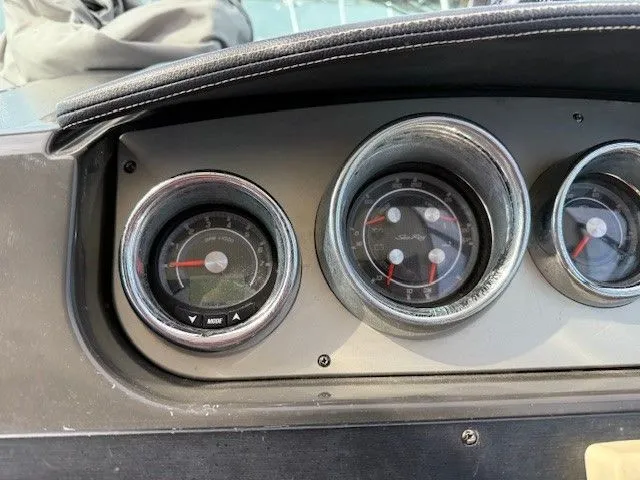 Bella Vida Yacht Photos Pics Dashboard gauges of a 2014 Sea Ray 310 Sundancer boat.
