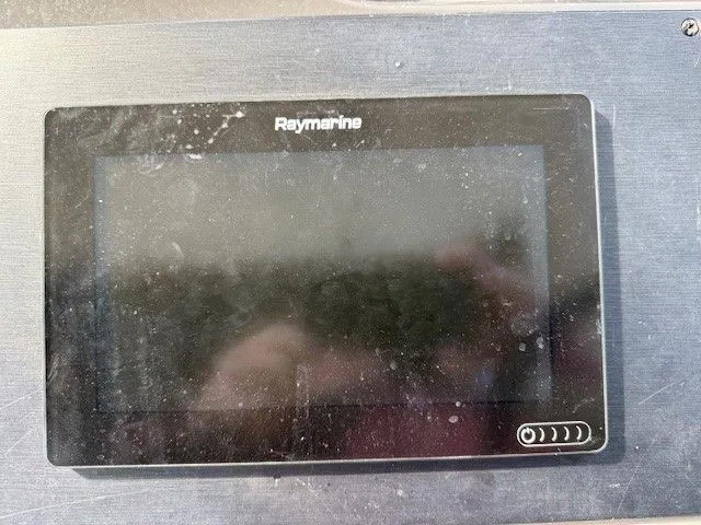 Bella Vida Yacht Photos Pics Raymarine display on 2014 Sea Ray 310 Sundancer boat dashboard.