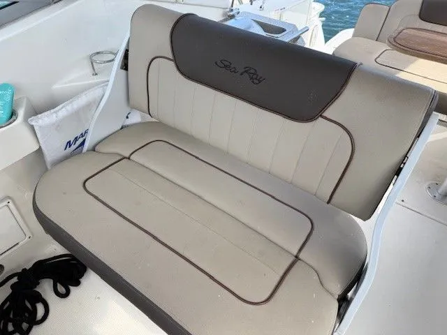 Bella Vida Yacht Photos Pics 2014 Sea Ray 310 Sundancer boat seating with beige and brown upholstery.