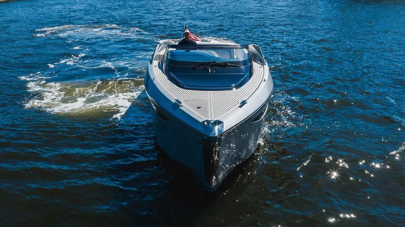 Little Princess Yacht Photos Pics 2020 Princess R35 yacht cruising on open water, viewed from the front.