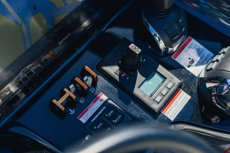 Little Princess Yacht Photos Pics Control panel of a 2020 Princess R35 yacht with various switches and displays.