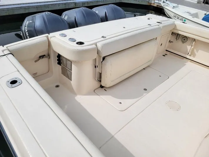  Yacht Photos Pics 2017 Grady-White 376 Canyon boat deck with triple outboard engines.