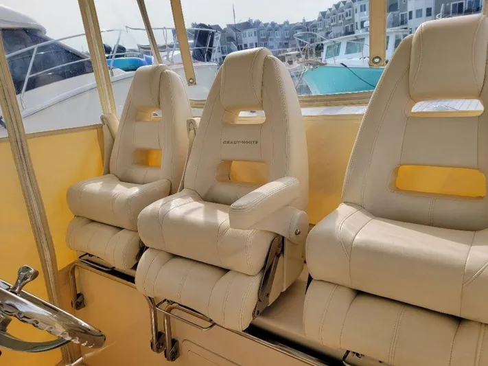 Yacht Photos Pics 2017 Grady-White 376 Canyon boat with beige captain's chairs.