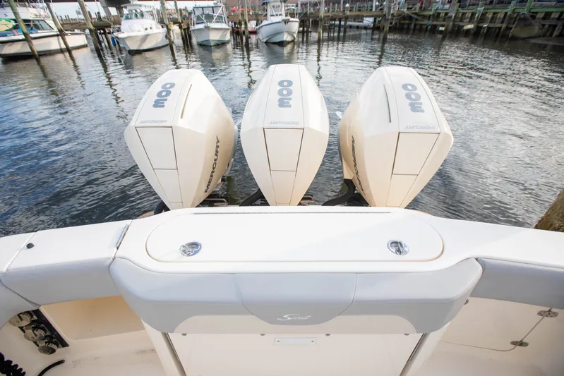  Yacht Photos Pics 2019 Scout 355 LXF boat with triple Mercury outboard engines docked at marina.