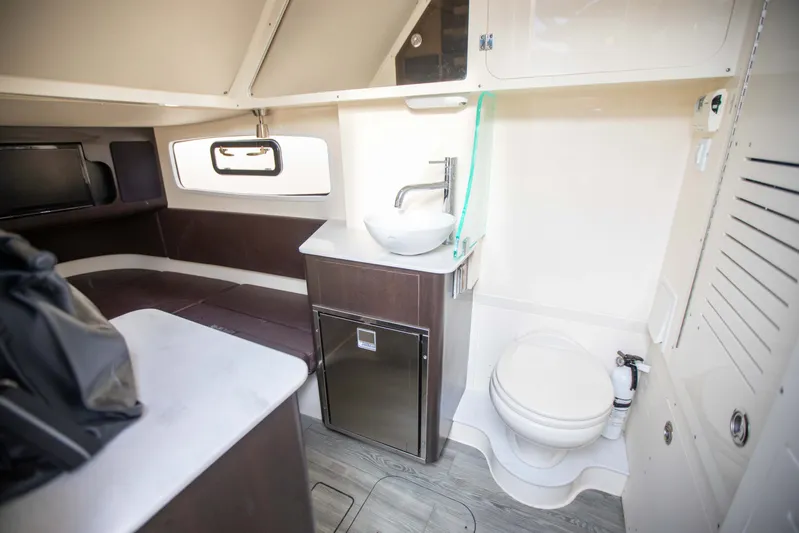  Yacht Photos Pics Luxurious 2019 Scout 355 LXF boat interior with modern amenities and sleek design.