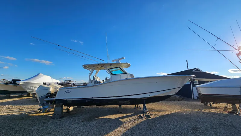  Yacht Photos Pics Scout 355 LXF 2019 boat on dry dock under sunny skies.