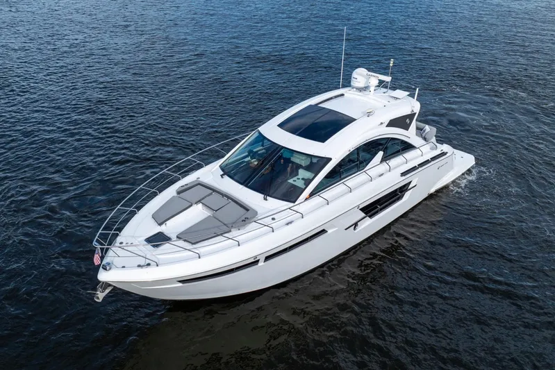 Tropical Dreamer Yacht Photos Pics 2022 Cruisers Yachts 54 Cantius luxury boat cruising on open water.