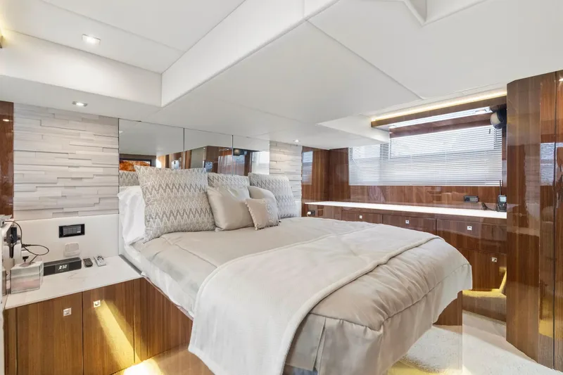 Tropical Dreamer Yacht Photos Pics Luxurious bedroom interior of 2022 Cruisers Yachts 54 Cantius with modern design and elegant finishes.