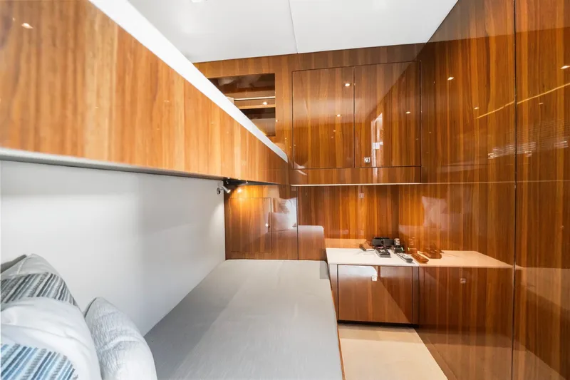 Tropical Dreamer Yacht Photos Pics 2022 Cruisers Yachts 54 Cantius interior with sleek wood paneling and modern design.