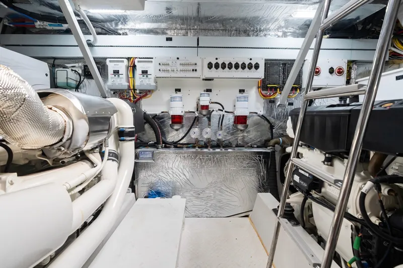 Tropical Dreamer Yacht Photos Pics Engine room of 2022 Cruisers Yachts 54 Cantius, showcasing advanced machinery and equipment.