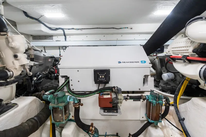 Tropical Dreamer Yacht Photos Pics Engine room of 2022 Cruisers Yachts 54 Cantius featuring Seakeeper 9 stabilizer.