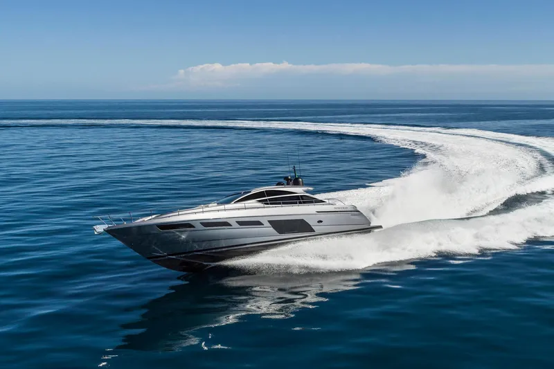  Yacht Photos Pics 2025 Pershing 6X yacht cruising swiftly on open sea.