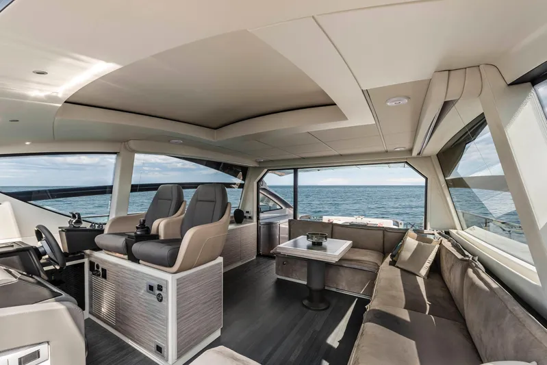  Yacht Photos Pics Luxurious interior of 2025 Pershing 6X yacht with ocean view.