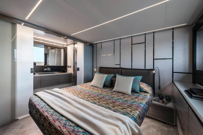  Yacht Photos Pics Luxurious bedroom interior of 2025 Pershing 6X yacht with modern design and elegant decor.