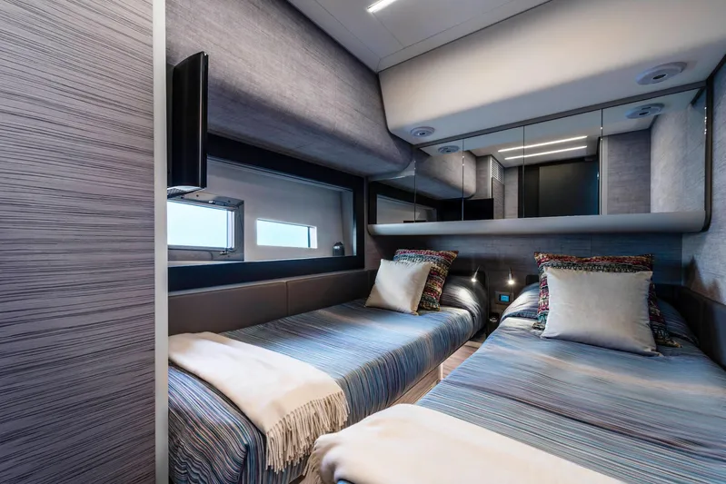  Yacht Photos Pics Luxurious twin cabin interior of 2025 Pershing 6X yacht with modern design.