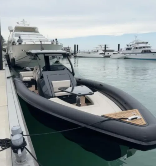 2024 Skipper 38 500r Yacht Photos Pics 2024 Skipper-BSK 38 luxury boat docked in a marina with other yachts.