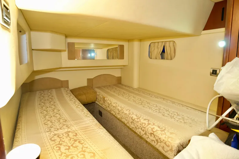  Yacht Photos Pics Interior cabin of 2006 Sea Ray 44 Sedan Bridge with twin beds.