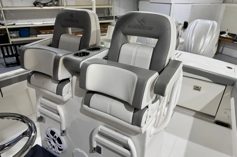  Yacht Photos Pics 2023 Regulator 28 boat seats with cup holders in a sleek, modern design.