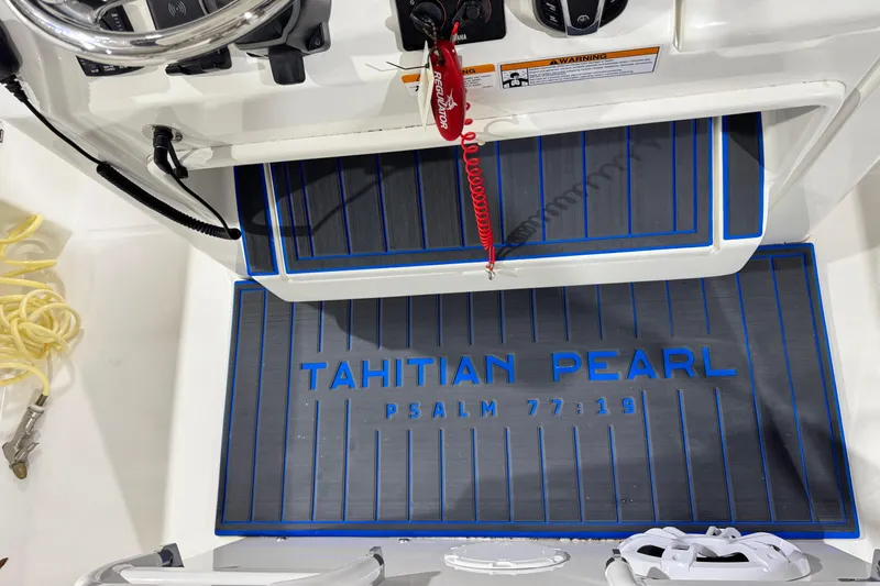  Yacht Photos Pics 2023 Regulator 28 boat deck with "Tahitian Pearl" and Psalm 77:19 inscription.