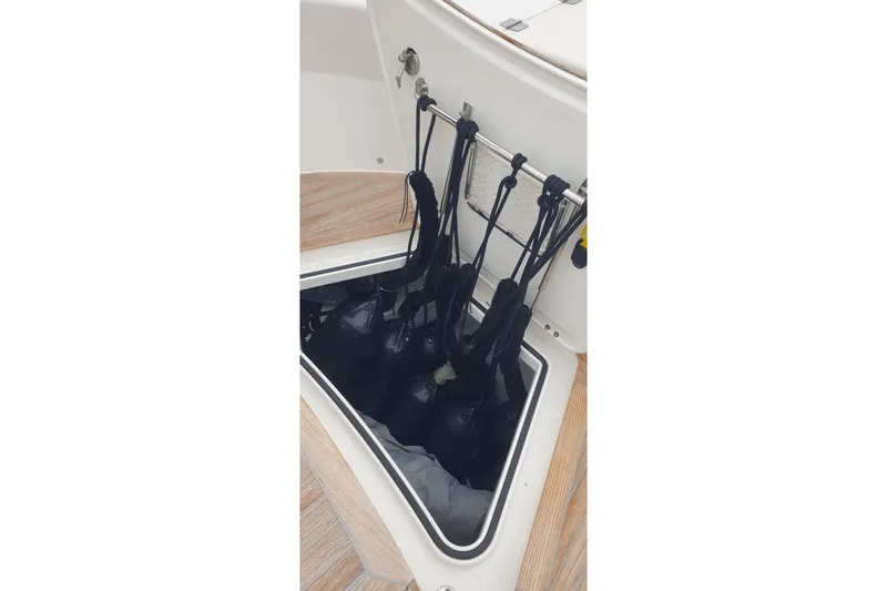 Point Break Yacht Photos Pics Storage compartment on 2021 Bluegame BG 42 yacht with neatly organized ropes.