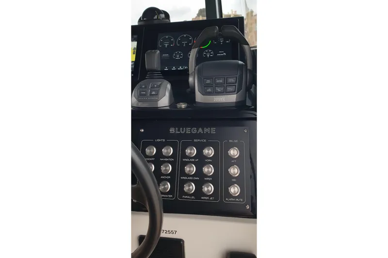 Point Break Yacht Photos Pics Control panel of 2021 Bluegame BG 42 yacht with various switches and displays.