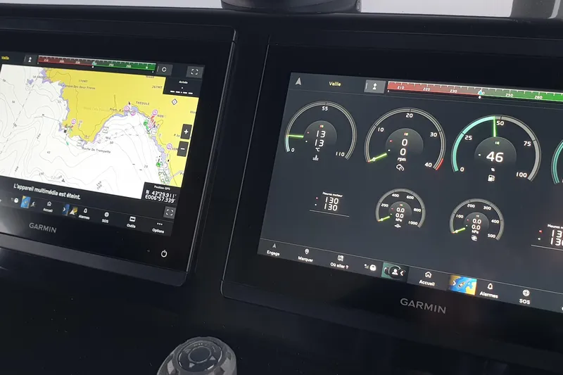 Point Break Yacht Photos Pics Garmin navigation and control screens on 2021 Bluegame BG 42 yacht dashboard.