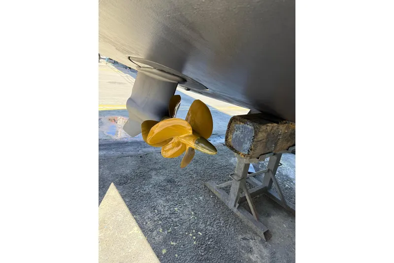 Point Break Yacht Photos Pics Golden propeller of 2021 Bluegame BG 42 yacht on dry dock.