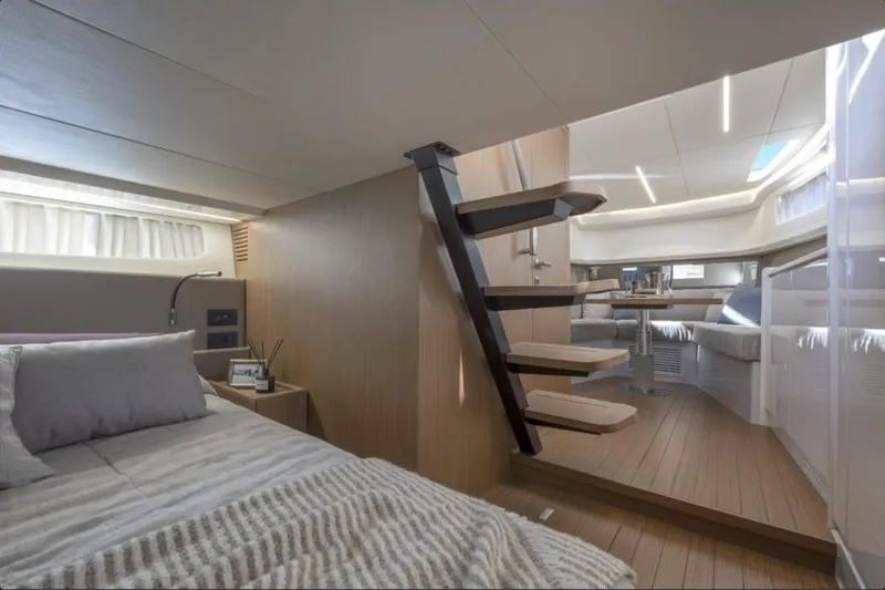 Point Break Yacht Photos Pics Luxurious interior of 2021 Bluegame BG 42 yacht with modern design and cozy furnishings.