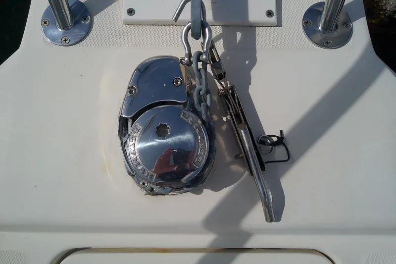 Dolce Far Niente Yacht Photos Pics Anchor windlass on 2004 Mainship 34 Pilot II boat deck.