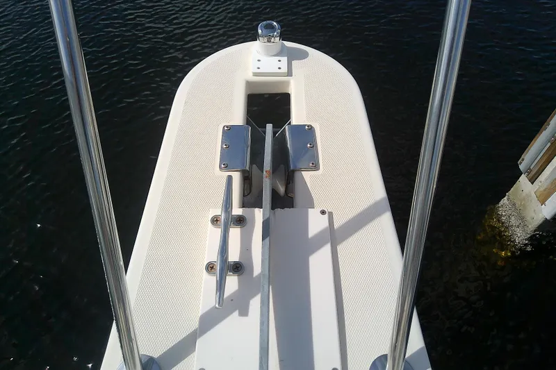 Dolce Far Niente Yacht Photos Pics Bow of 2004 Mainship 34 Pilot II boat with anchor and railing.