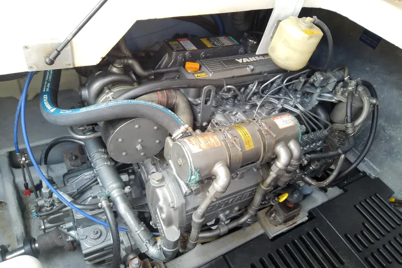 Dolce Far Niente Yacht Photos Pics Engine compartment of 2004 Mainship 34 Pilot II with Yamaha engine components.