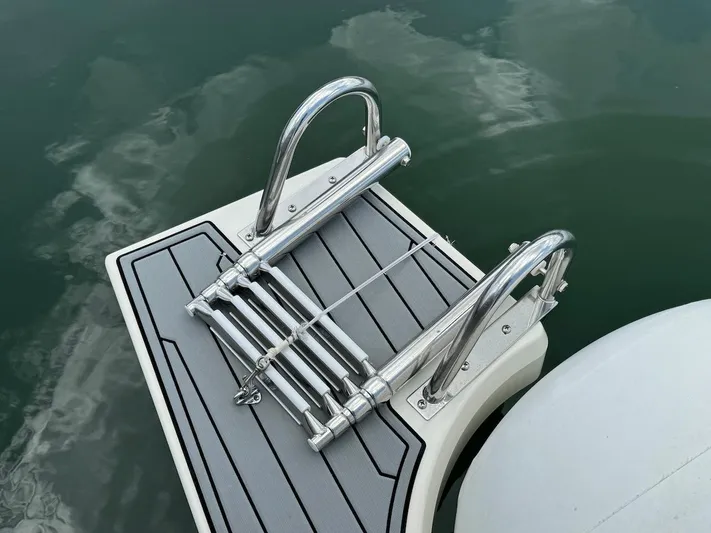  Yacht Photos Pics 2022 Brig Eagle 10 swim platform with stainless steel ladder.