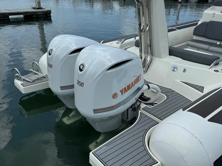  Yacht Photos Pics 2022 Brig Eagle 10 with twin Yamaha 300 outboard engines at dock.