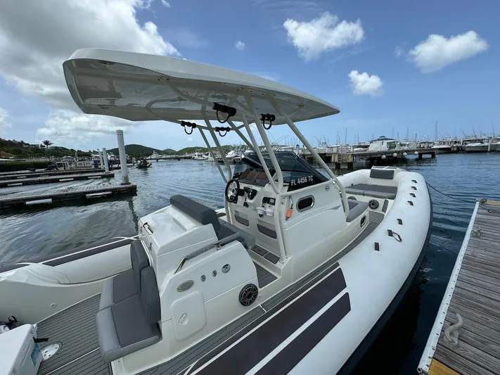  Yacht Photos Pics 2022 Brig Eagle 10 boat docked at marina with clear sky.