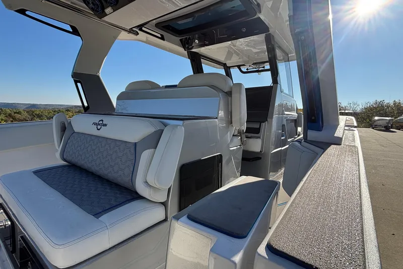  Yacht Photos Pics 2024 Fountain 38 SCX boat interior with luxurious seating and modern design.