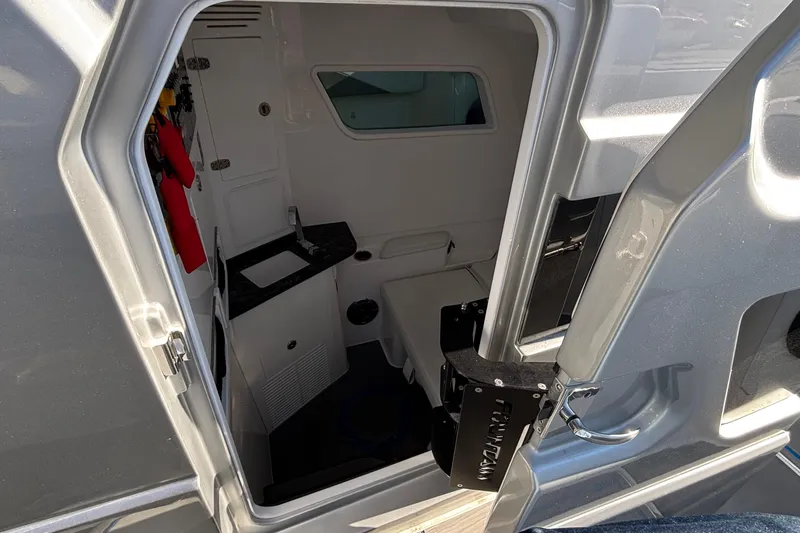  Yacht Photos Pics 2024 Fountain 38 SCX cabin interior with compact design and modern amenities.