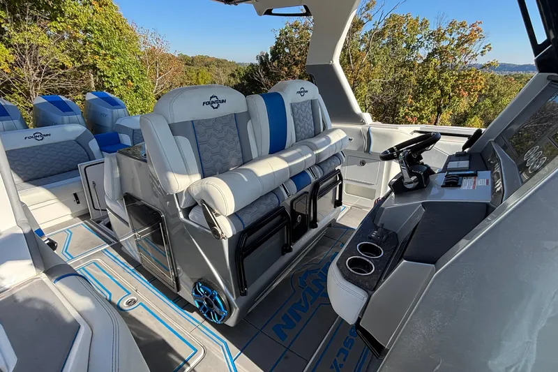  Yacht Photos Pics 2024 Fountain 38 SCX boat interior with luxurious seating and modern dashboard.