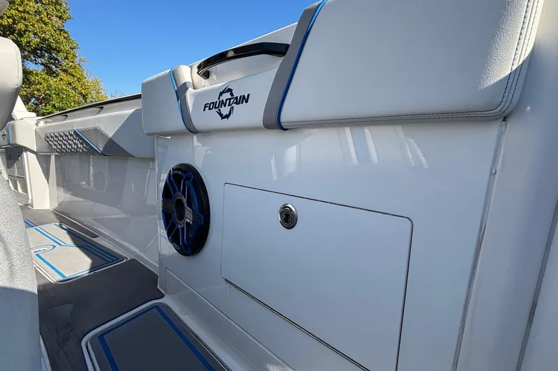  Yacht Photos Pics 2024 Fountain 38 SCX boat interior with sleek design and blue accents.