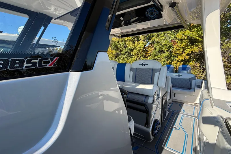  Yacht Photos Pics 2024 Fountain 38 SCX boat interior with luxurious seating and modern design.