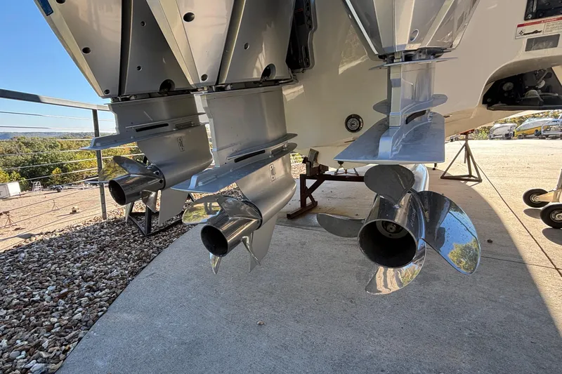  Yacht Photos Pics 2024 Fountain 38 SCX boat propellers on display outdoors.