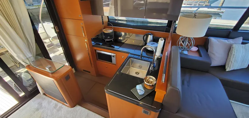 " La Bella Vita" Yacht Photos Pics Luxurious kitchen interior of 2017 Prestige 560 Flybridge yacht with modern amenities.